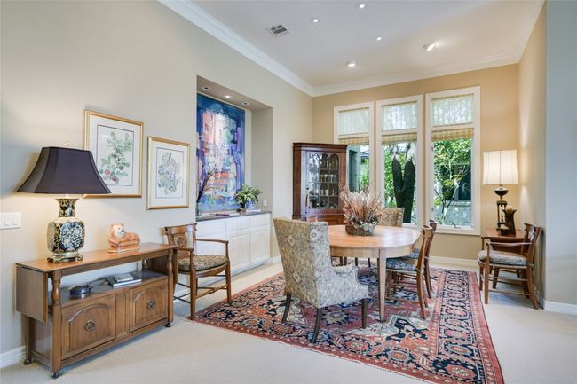 Dining room with lots of natural light | Image 9