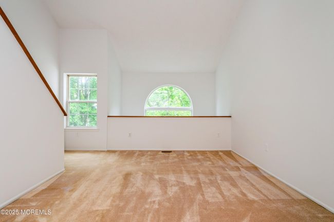 Primary Bedroom with ensuite bath, cathedral ceiling and walk in closet | Image 17