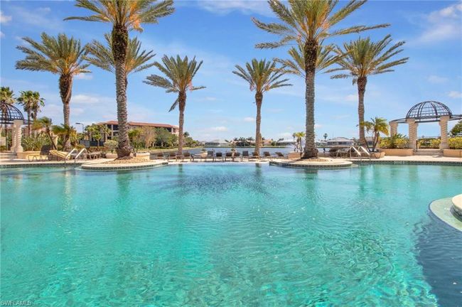 Community pool featuring a patio area | Image 35