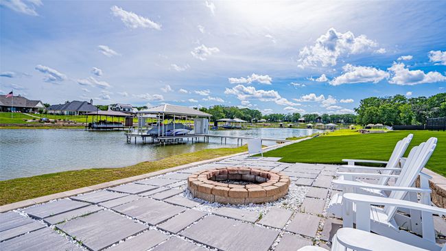 Firepit for the cool evenings. This home isn't just for summer. | Image 12