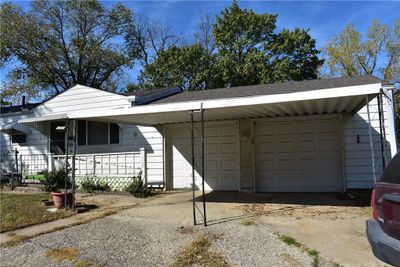 View of front of house featuring a garage | Image 3