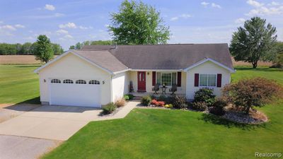 7481 Reid Road, Home with 3 bedrooms, 2 bathrooms and null parking in Gaines Twp MI | Image 1