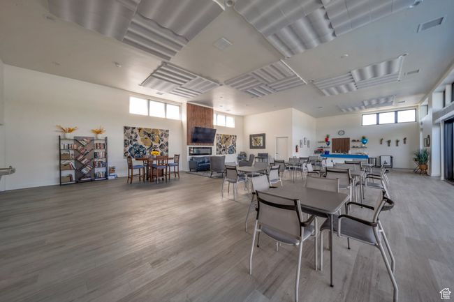 Dining space with wood finished floors | Image 19