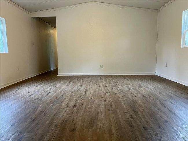 Hallway to spare bedrooms/bath | Image 11