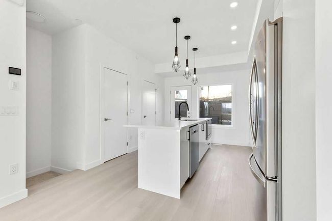 322 Sage Hill Circle Nw, Townhouse with 4 bedrooms, 5 bathrooms and 3 parking in Calgary AB | Image 5