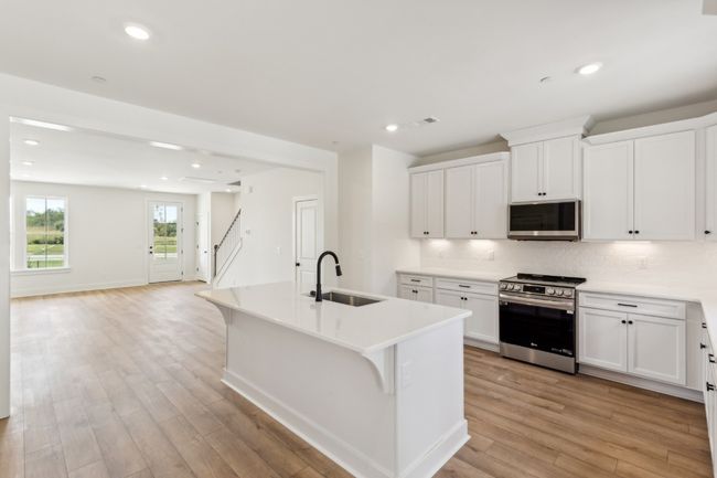 Enormous kitchen, sizable living space-- why settle for less? Actual photo of home. | Image 12