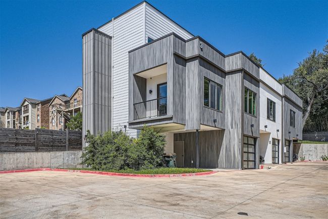 Parking is a breeze with both a 1-car carport and a 1-car garage. | Image 6
