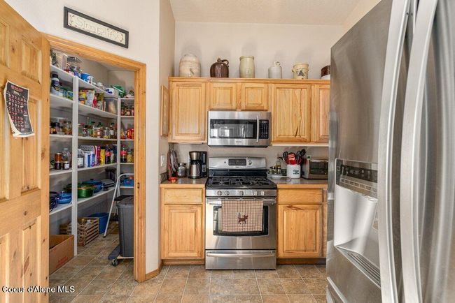 Spacious walk-in pantry | Image 17