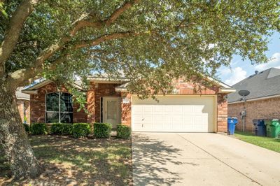 View of front of home with a garage | Image 2