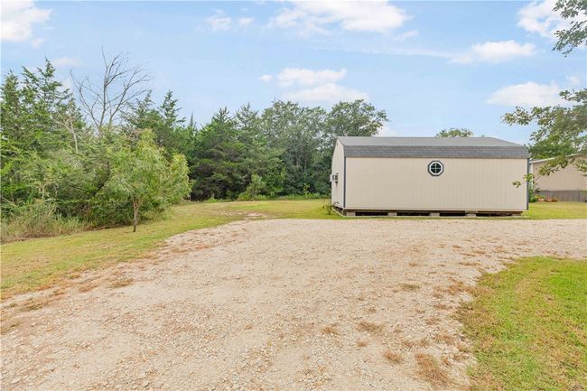 28x16 party barn, heated & cooled with laminate flooring and wood accent walls | Image 12