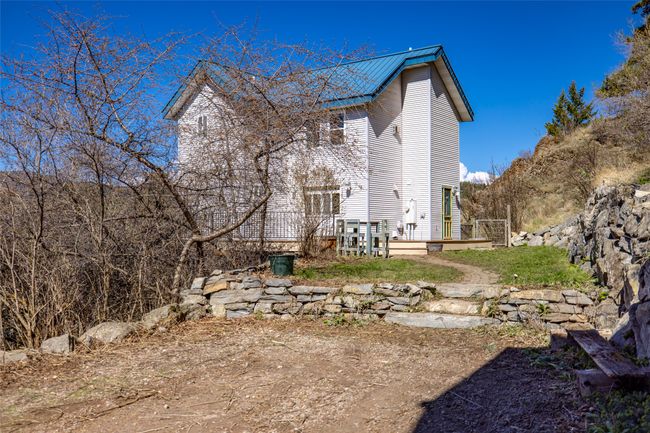 View of property exterior featuring metal roof | Image 80