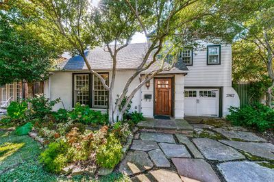 View of front of property with a garage | Image 1