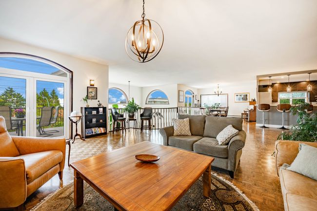 Living room featuring a chandelier | Image 5