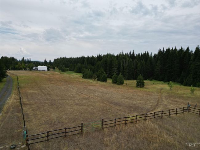 View of yard featuring a view of rural / pastoral area and a forest view | Image 17