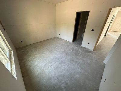 Spare room featuring concrete flooring | Image 3