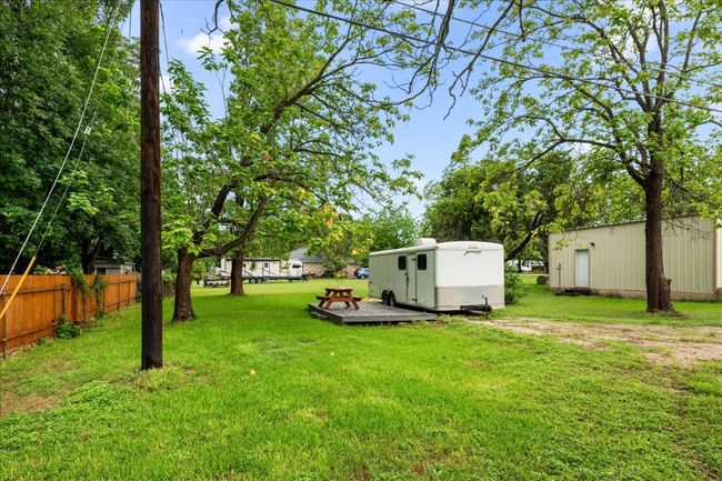 View of yard featuring an outbuilding | Image 33