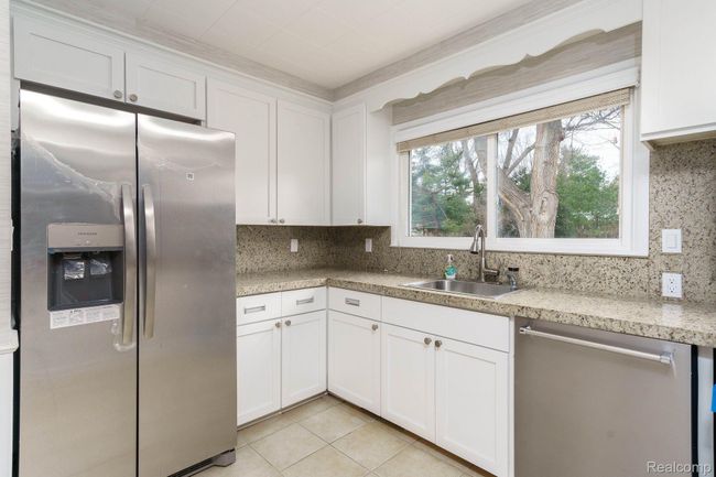 kitchen with new stainless steel appliances | Image 11