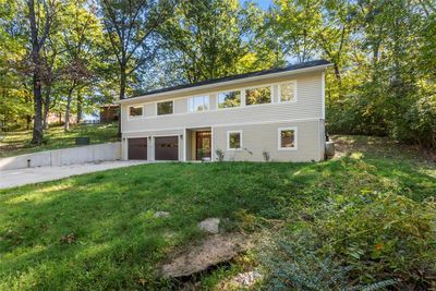 View of front of home with a front yard and a garage | Image 3