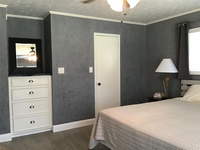 Primary bedroom with built-in and closet | Image 24