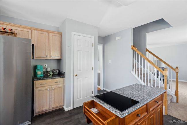 The door next to the cabinet is the pantry | Image 19