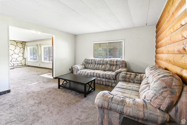 Living room featuring carpet flooring | Image 9