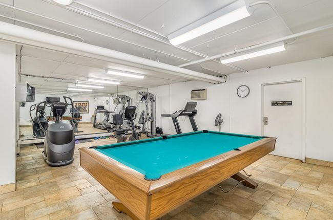 Exercise room and pool table | Image 17