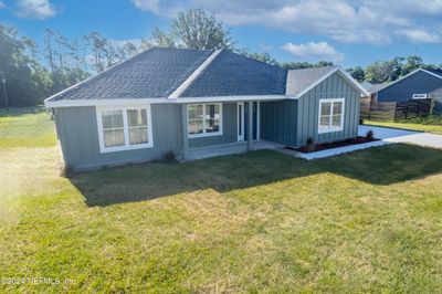 11945 Elm Street, House other with 3 bedrooms, 2 bathrooms and null parking in Brooker FL | Image 2