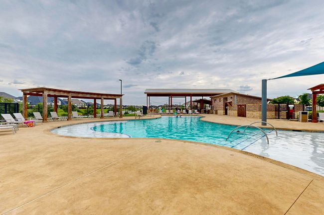 Community pool featuring a patio | Image 38