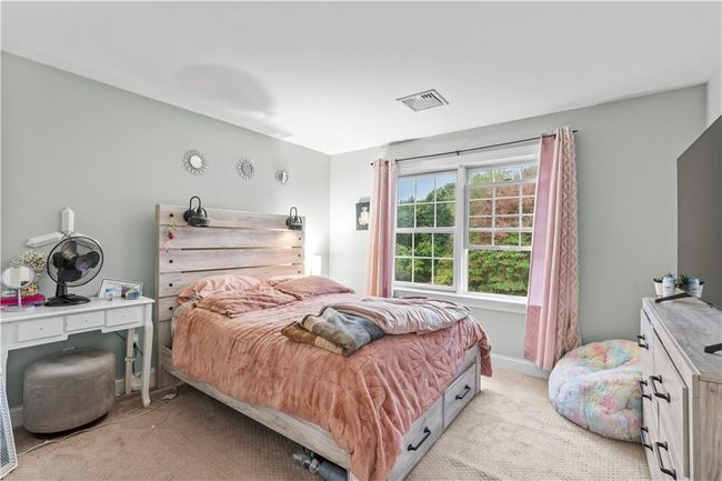 Bedroom with light carpet | Image 23