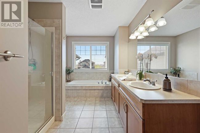 121 Hawkmere Pl, House other with 4 bedrooms, 4 bathrooms and 4 parking in Chestermere AB | Image 34