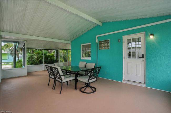 Sunroom with outdoor dining space | Image 12