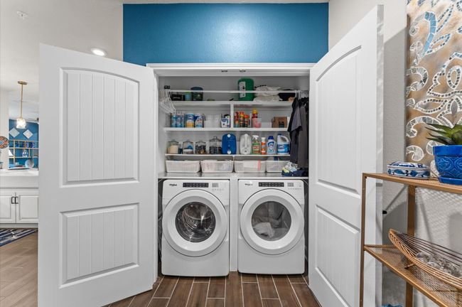 Private in-unit laundry space allows for added convenience and built-in storage. | Image 19