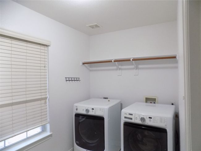 Laundry room featuring separate washer and dryer | Image 20