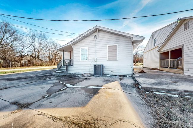 Back of property featuring central air condition unit | Image 33
