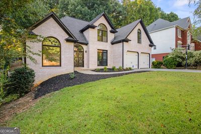 3020 Towneside Lane, House other with 5 bedrooms, 3 bathrooms and 6 parking in Woodstock GA | Image 2