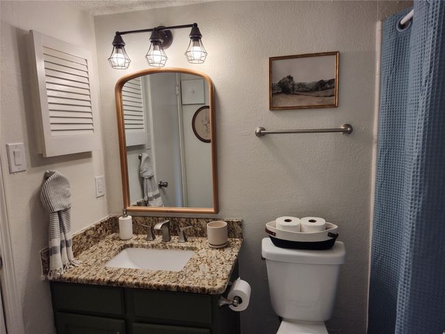 Bathroom with a vanity, and toilet | Image 8