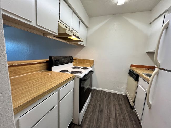 Here is the kitchen. Notice all of the cabinet space. | Image 6