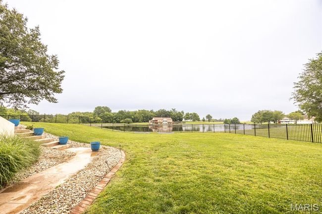View of yard featuring a water view | Image 46