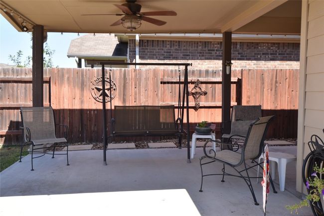 Patio has room for lots of furniture to relax in. | Image 31