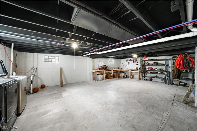 Basement featuring independent washer and dryer | Image 21