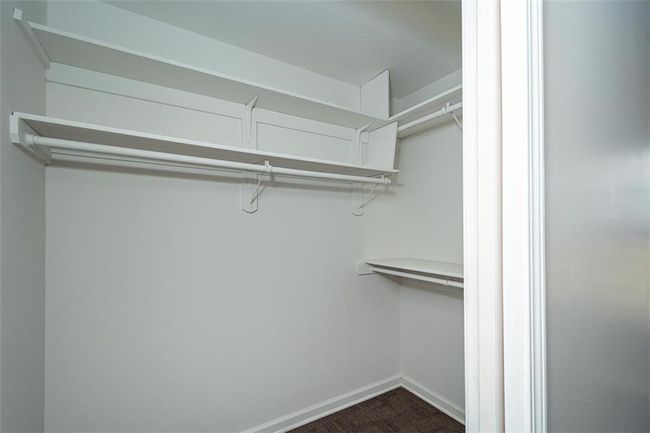 View of spacious closet | Image 26
