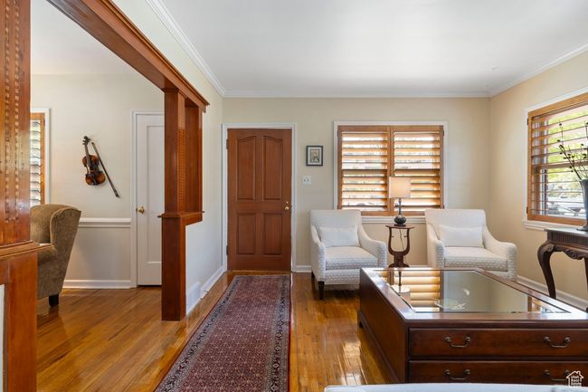 Foyer featuring light wood-style flooring and ornamental molding | Image 10