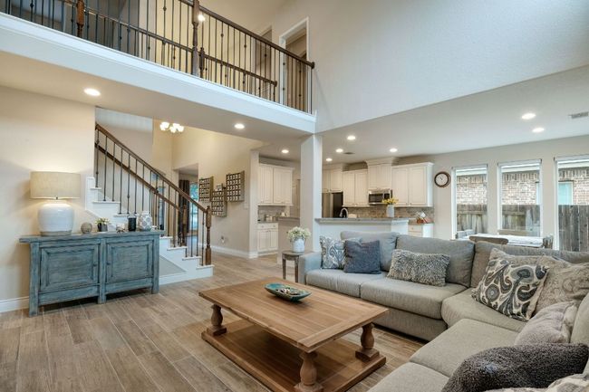 20 foot ceilings and open-concept living make this home feel large and welcoming. | Image 5