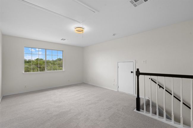 Upstairs with nice views and great space for playroom | Image 29