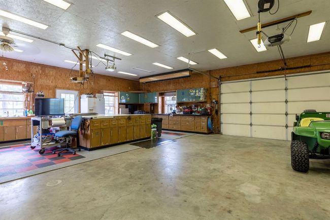Interior of the workshop. See the large pull-down screen for movie watching and SPORTS! | Image 24