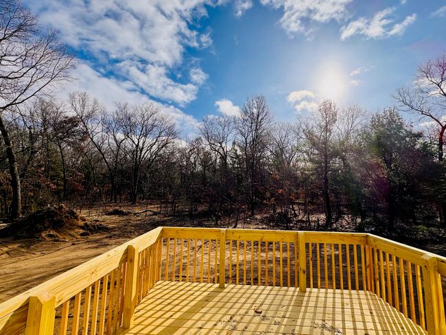 Spacious deck overlooking private backyard | Image 25