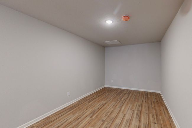 Empty room with light hardwood / wood-style flooring | Image 37
