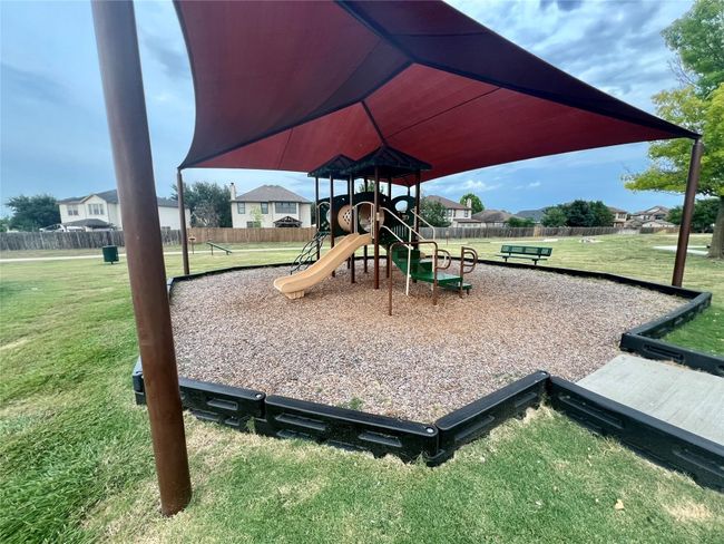 Communal playground with a residential view | Image 35