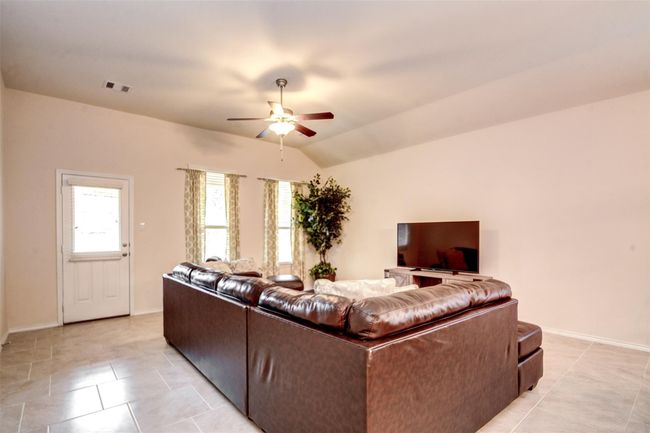 Large wall space lets you easily fit all your furniture into this room. | Image 16