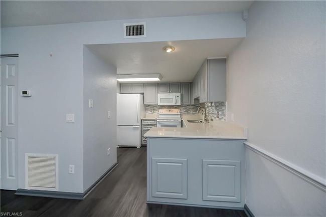 104 - 1051 Forrest Nelson Blvd, Condo with 2 bedrooms, 2 bathrooms and null parking in PORT CHARLOTTE FL | Image 15